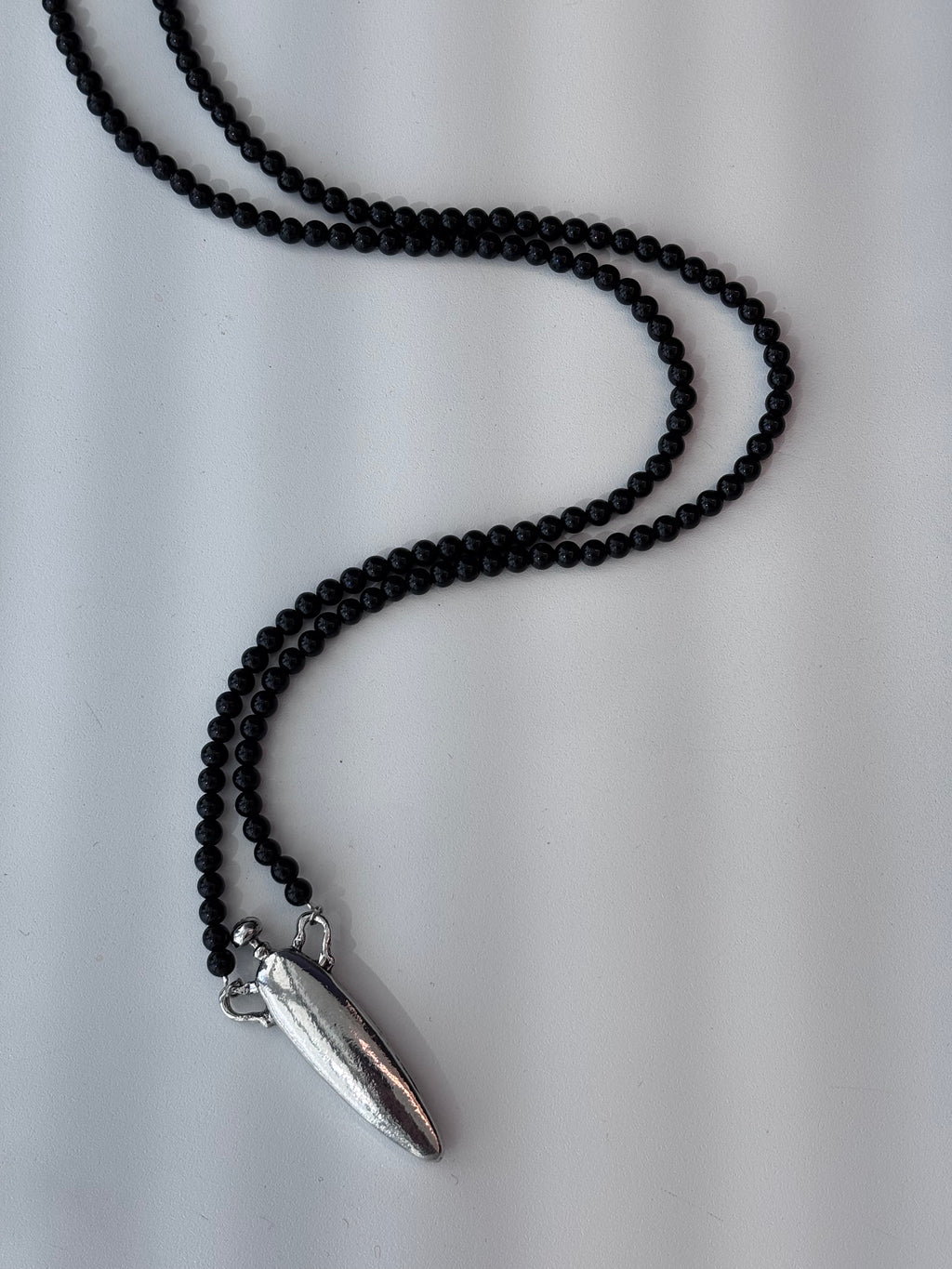 Long bottle necklace