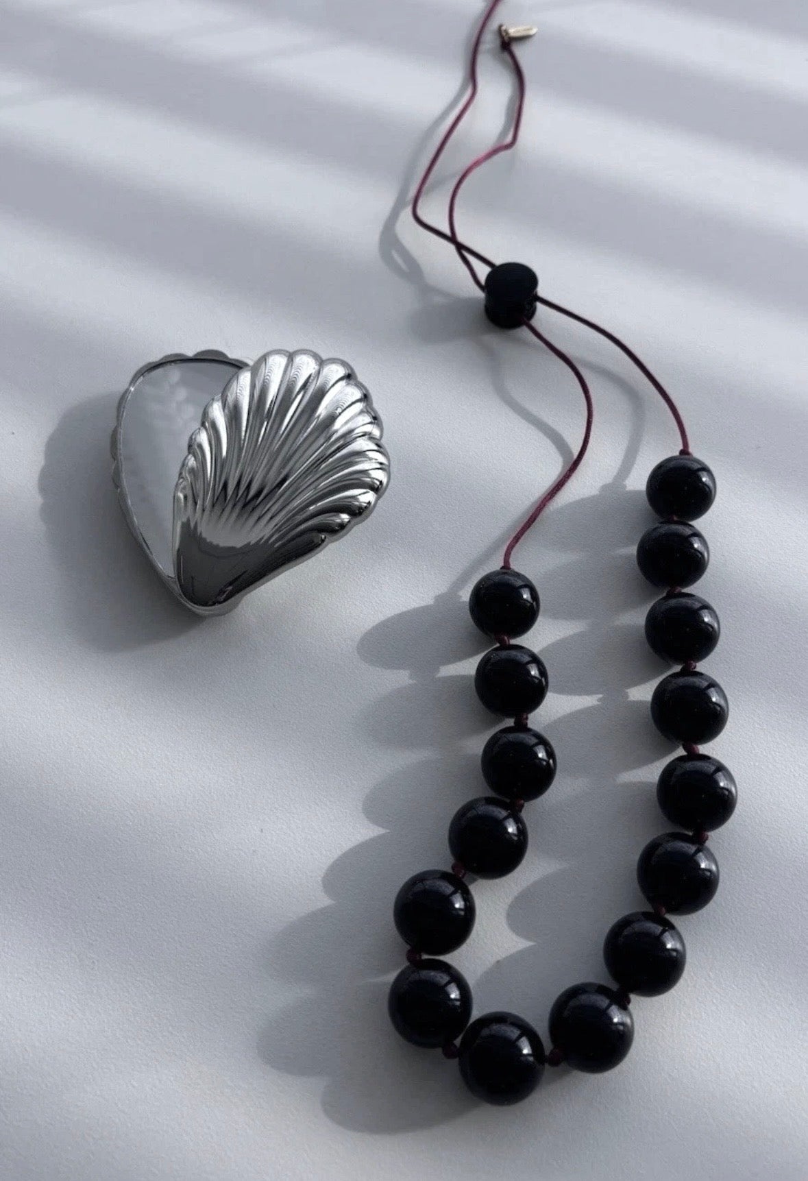 Sphere Necklace Of Black Onyx With Red Cord